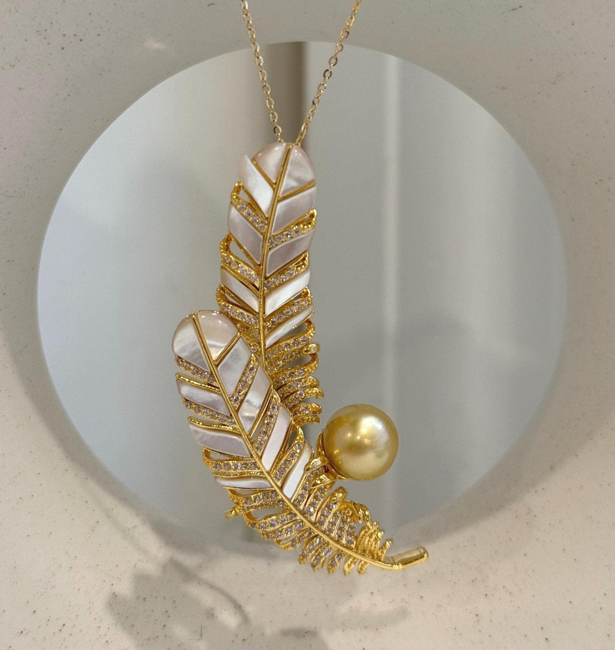 Sparkling feather outlines surrounding white iridescent panels
