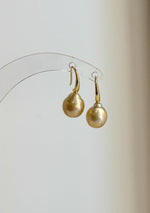 South Sea pearl drop earrings with warm champagne gold tones.