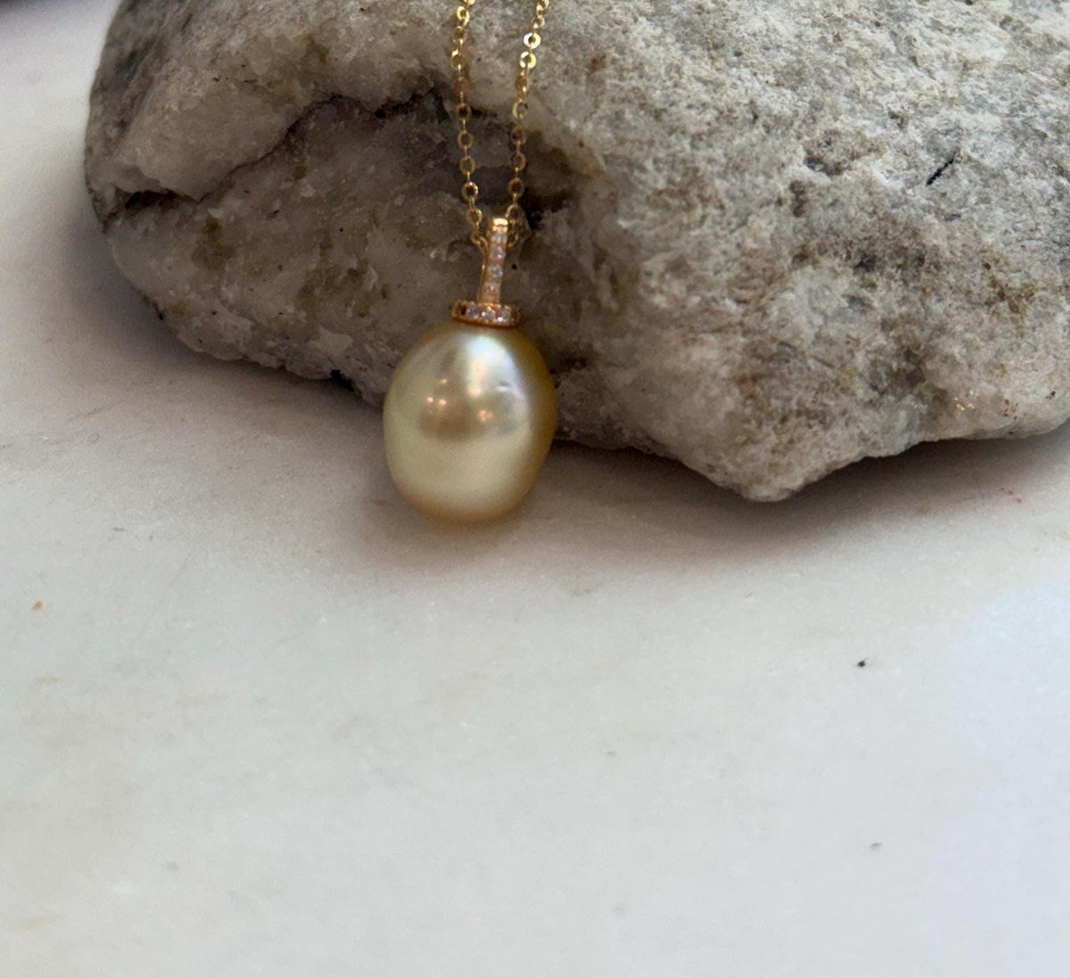 Golden South Sea pearl paired with an S925 sterling silver pendant setting.