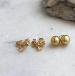 Deep tea gold pearl stud earrings in sterling silver settings.