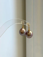 Rose mauve Edison pearl hook earrings with mirror luster and sterling silver hooks
