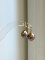 Rose purple freshwater pearl earrings with natural iridescent glow