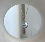 South Sea pearl pendant combining cool silver blue tones with an 18K solid gold setting.