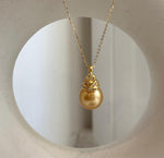 Deep tea gold South Sea pearl pendant with mirror luster and S925 sterling silver setting.
