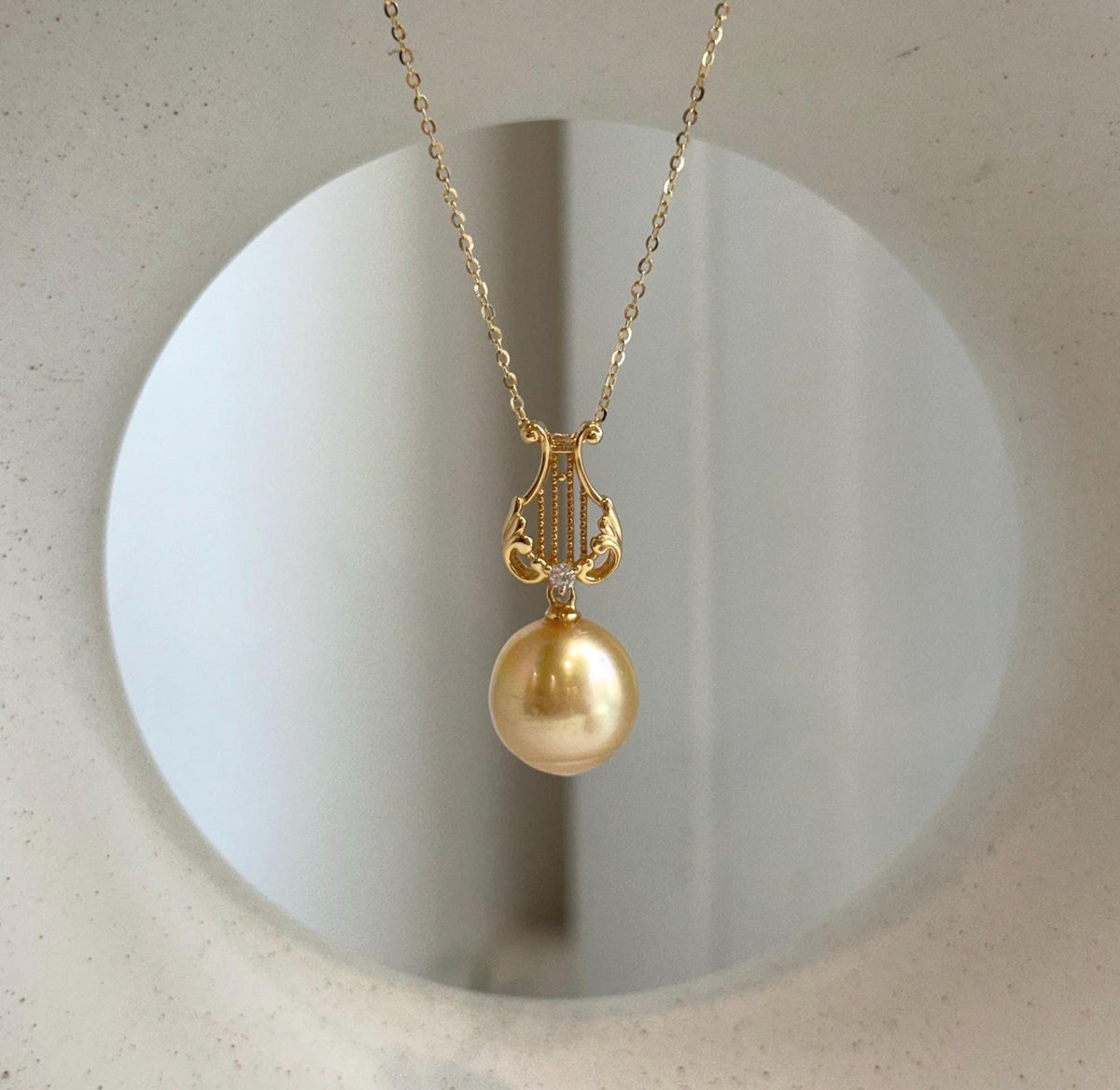 Deep tea gold pearl pendant combining warm pearl tones with S925 sterling silver.