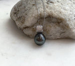 Deep hunter green pearl pendant with crystal details in S925 sterling silver.