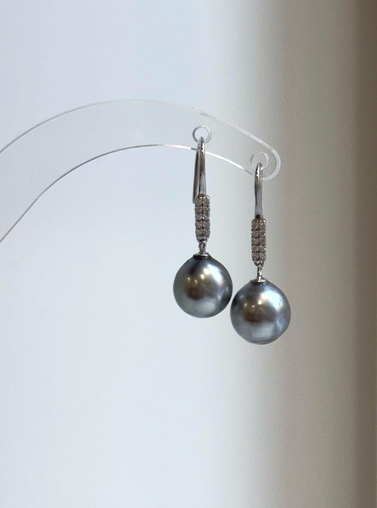 Lustrous gray pearls with sparkling silver hook details