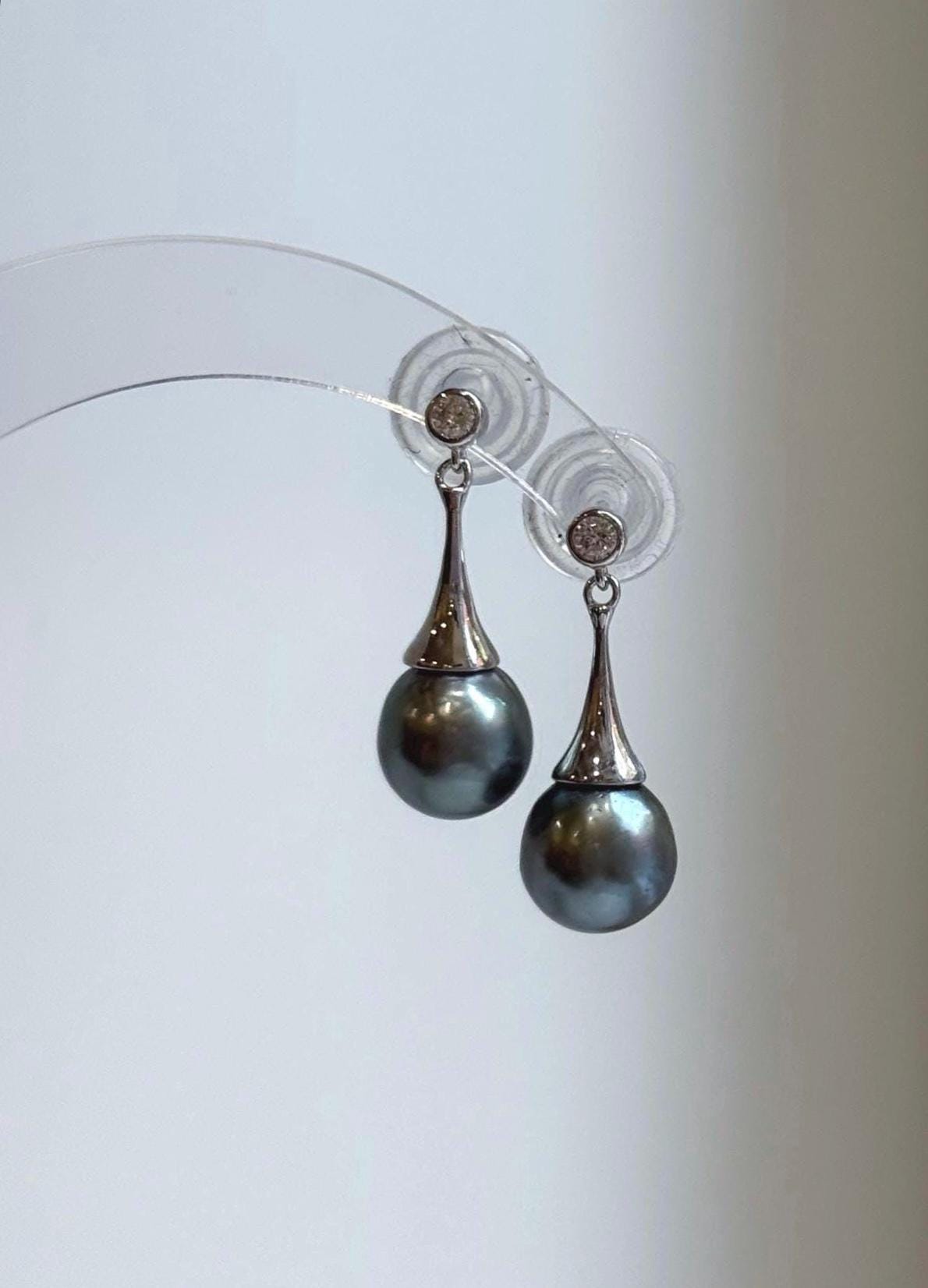 Lustrous gray pearls with sparkling silver accents