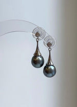 Lustrous gray pearls with sparkling silver accents
