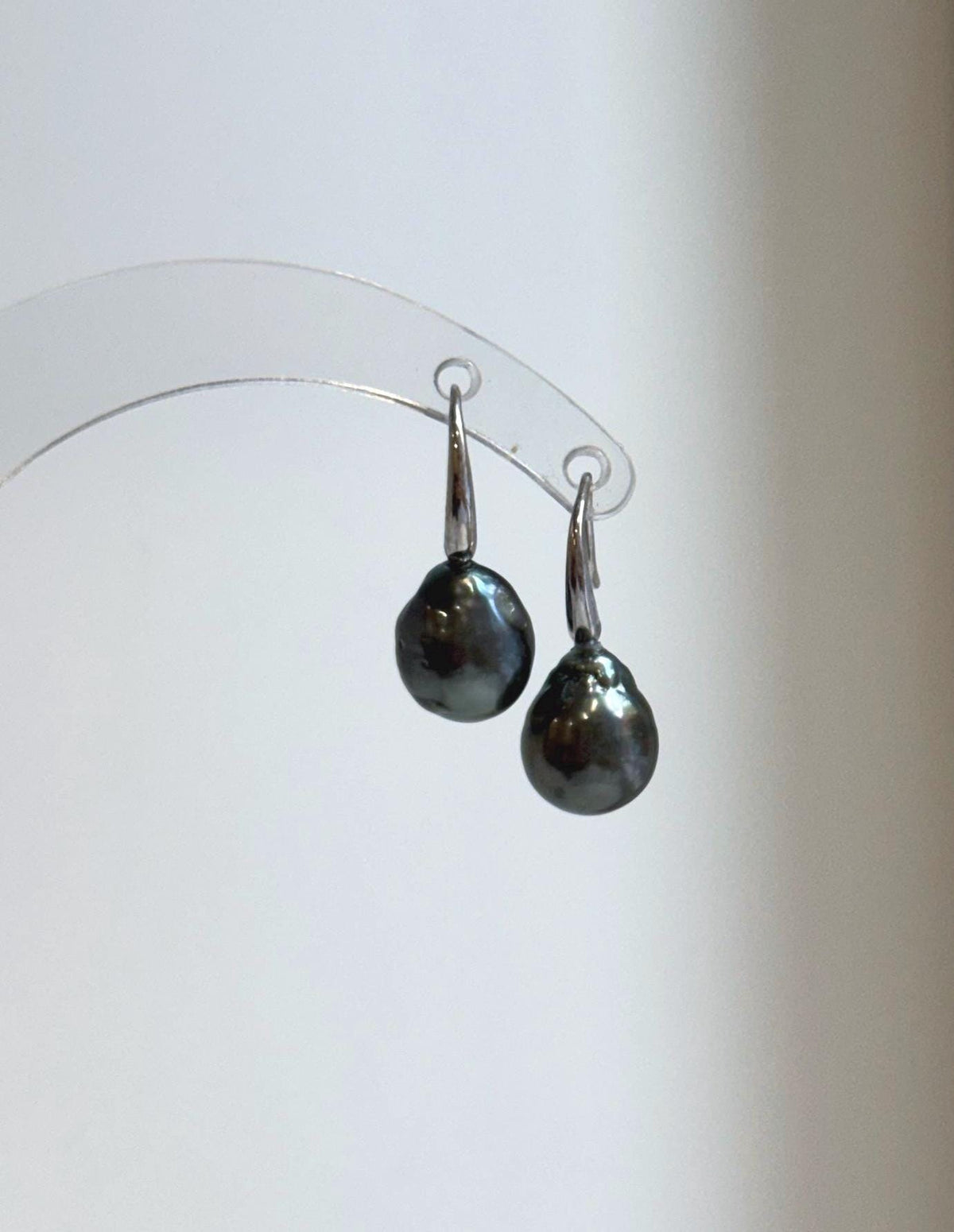 Lustrous gray pearls with sparkling silver hook details
