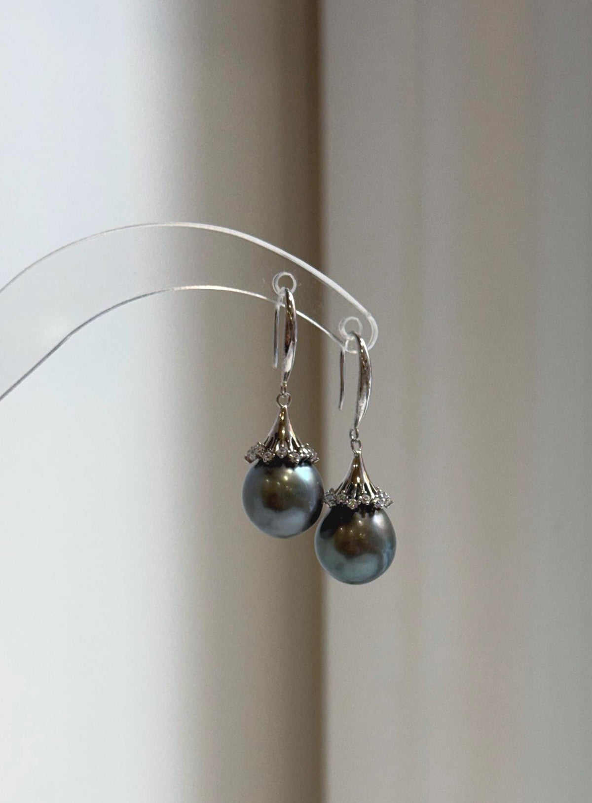 Platinum gray pearl earrings with floral silver settings