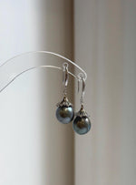 Platinum gray pearl earrings with floral silver settings