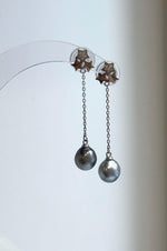 Tahitian pearl drops suspended from delicate silver chains