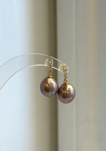 Rose mauve Edison pearl earrings with mirror luster and S925 sterling silver settings.