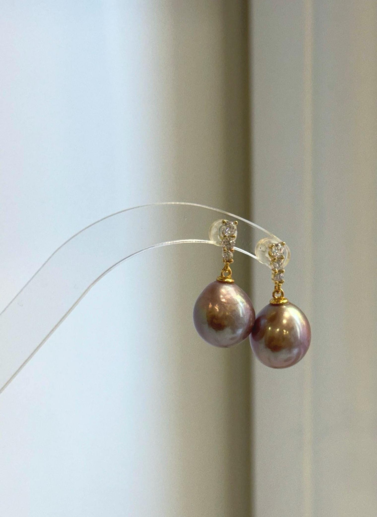Lustrous rose mauve Edison pearls paired with S925 sterling silver settings.