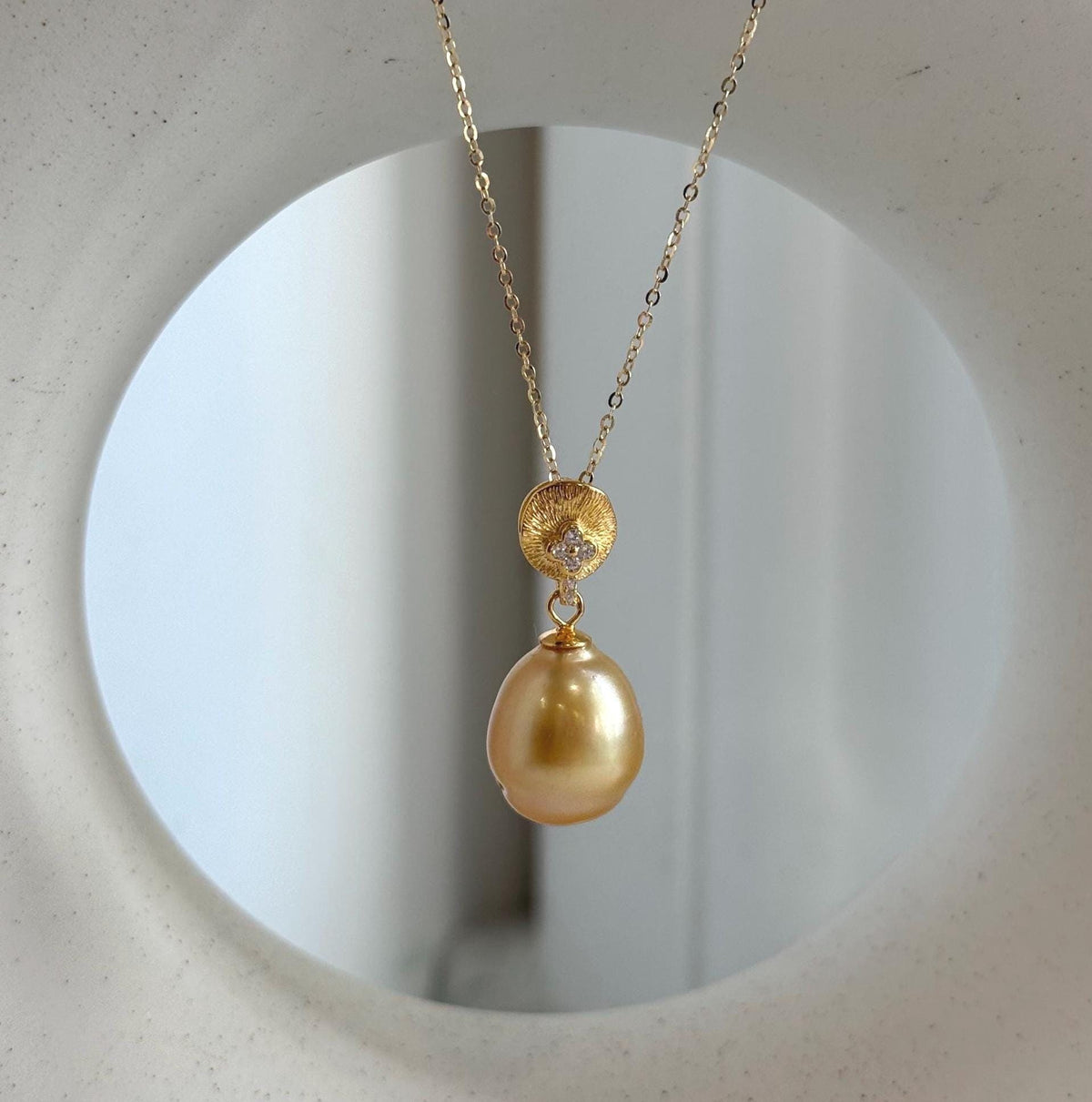 Deep tea gold South Sea pearl pendant with mirror luster and S925 sterling silver setting.