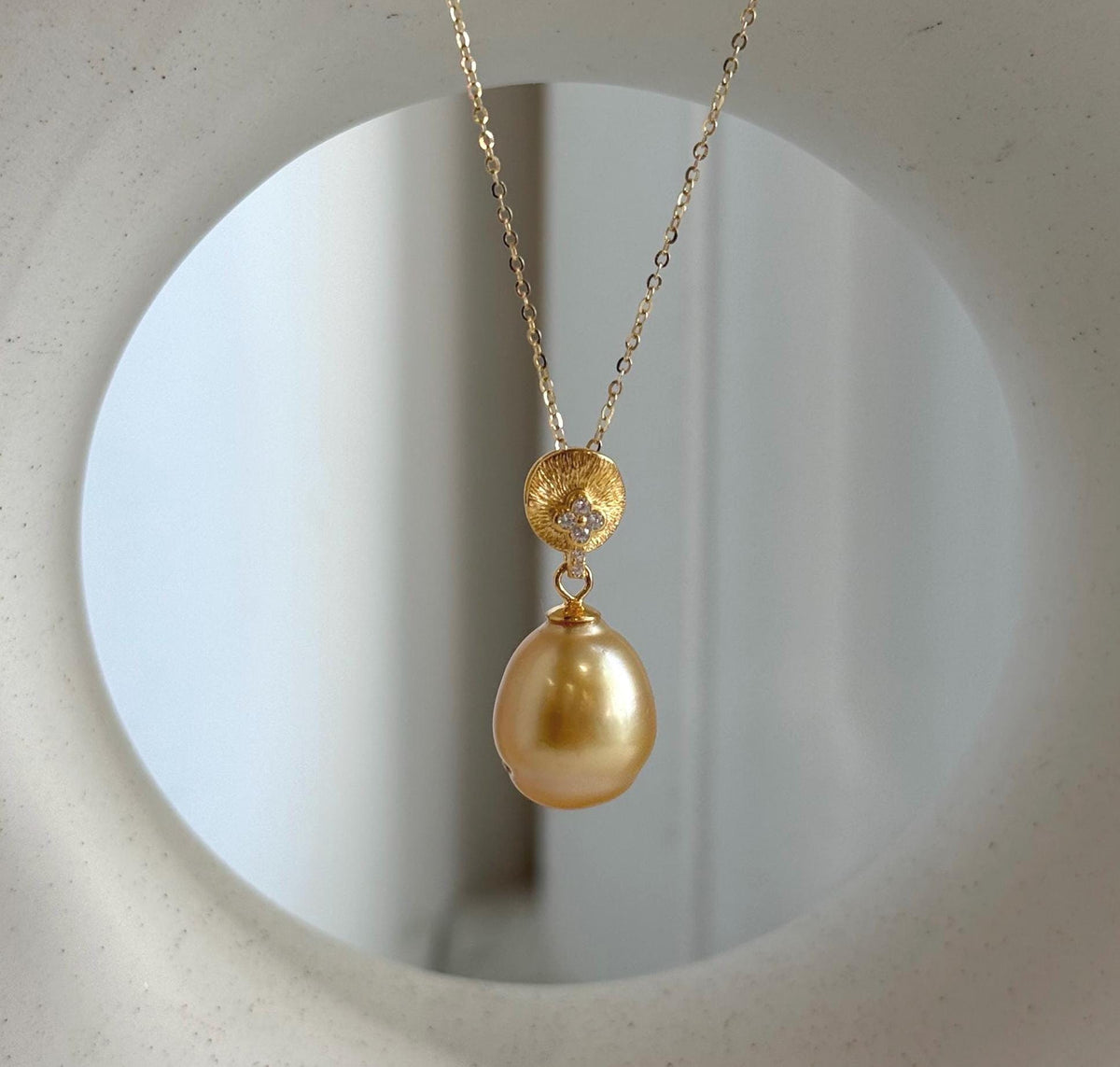 South Sea pearl pendant featuring brilliant luster and sterling silver detailing.