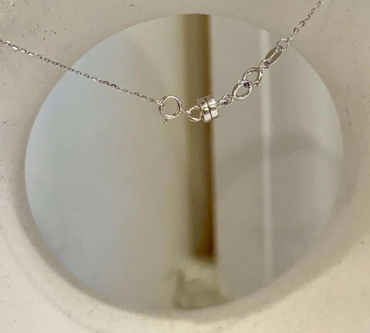 Elly’s Australian silver blue South Sea pearl pendant with shimmering luster and sterling silver.