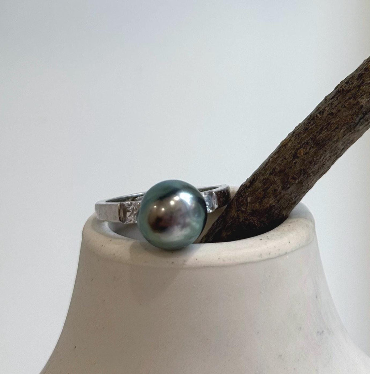 Lustrous peacock green saltwater pearl set in an S925 silver ring.