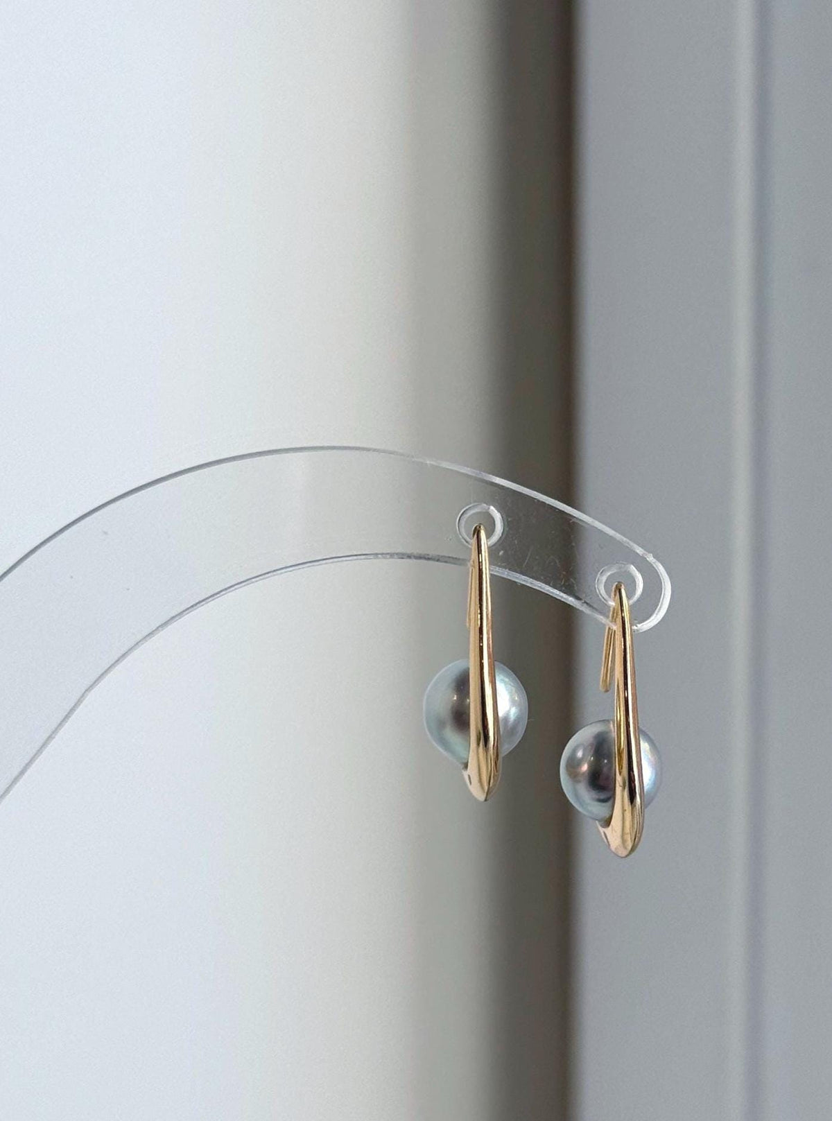 Silver blue Akoya pearl earrings with curved S925 sterling silver hooks.