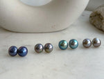 Round Mabe pearls with a luminous surface set in S925 sterling silver earrings.