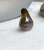 Golden mabe pearl ring with rainbow overtones