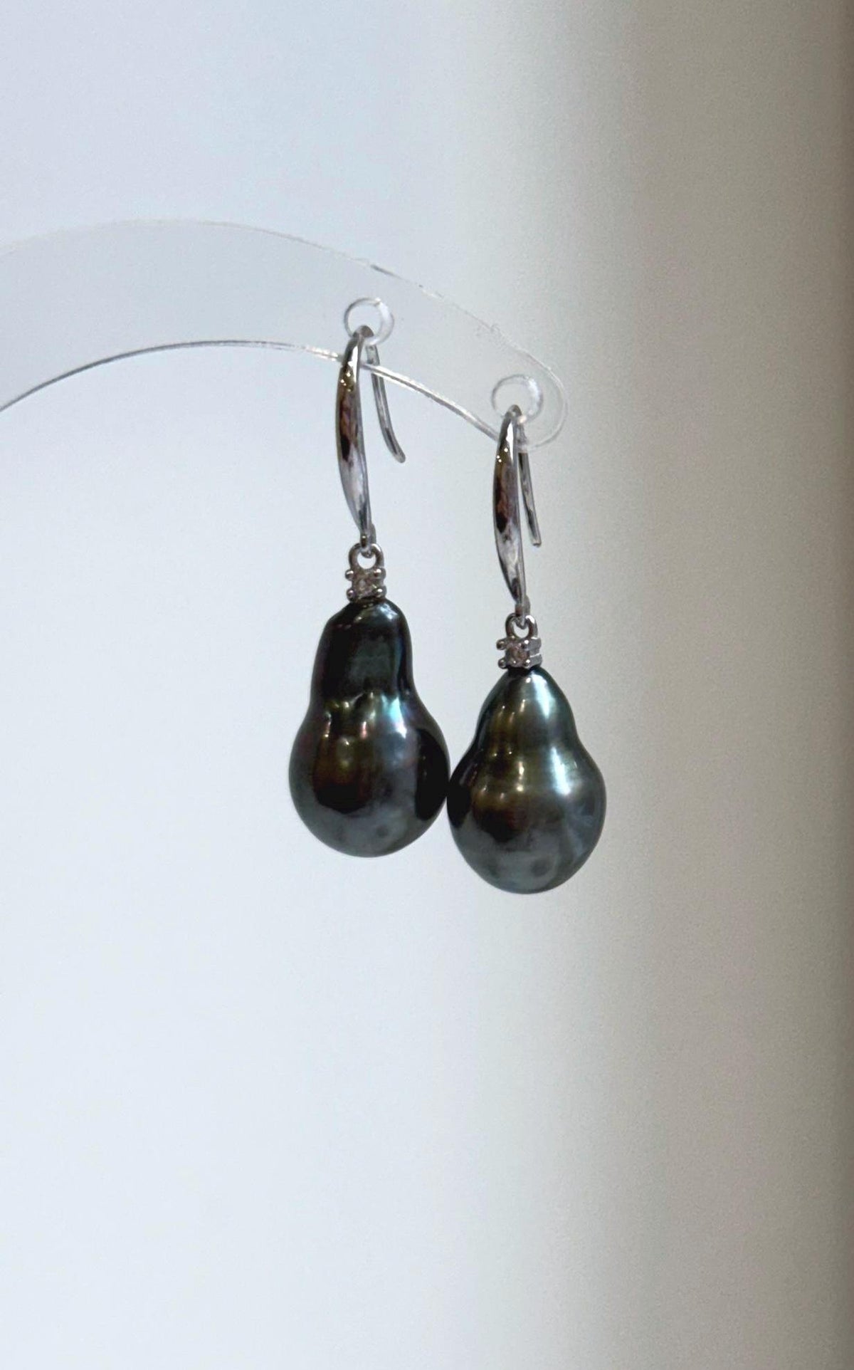 Hunter green saltwater pearl earrings with mirror luster