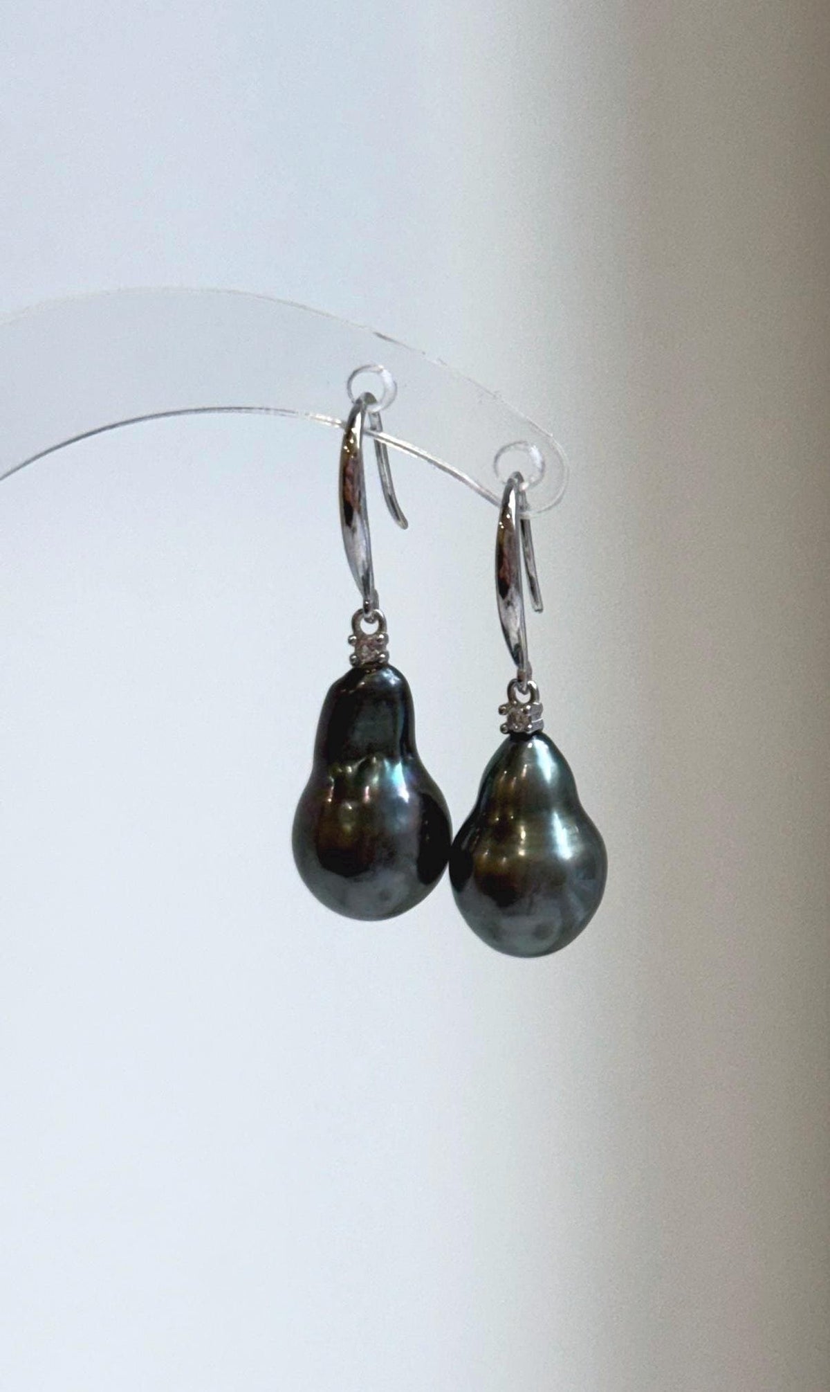 Lustrous green ocean pearl hook earrings