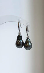 Lustrous green ocean pearl hook earrings