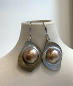 S925 sterling silver drop earrings featuring golden mabe pearls.