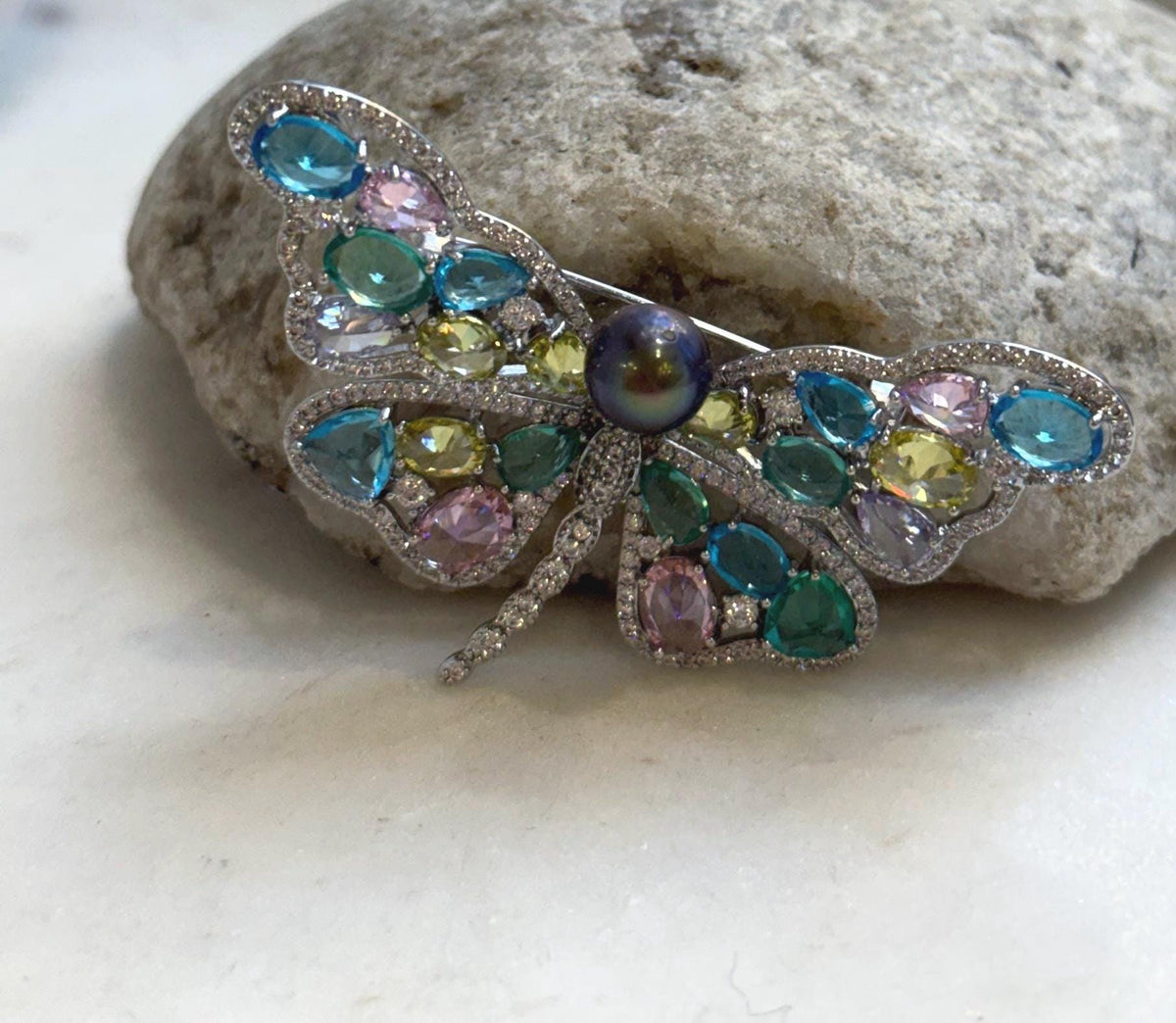 Tahitian pearl butterfly brooch pendant with sparkling multicolor wings.