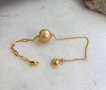 Golden South Sea pearl with silver fittings.