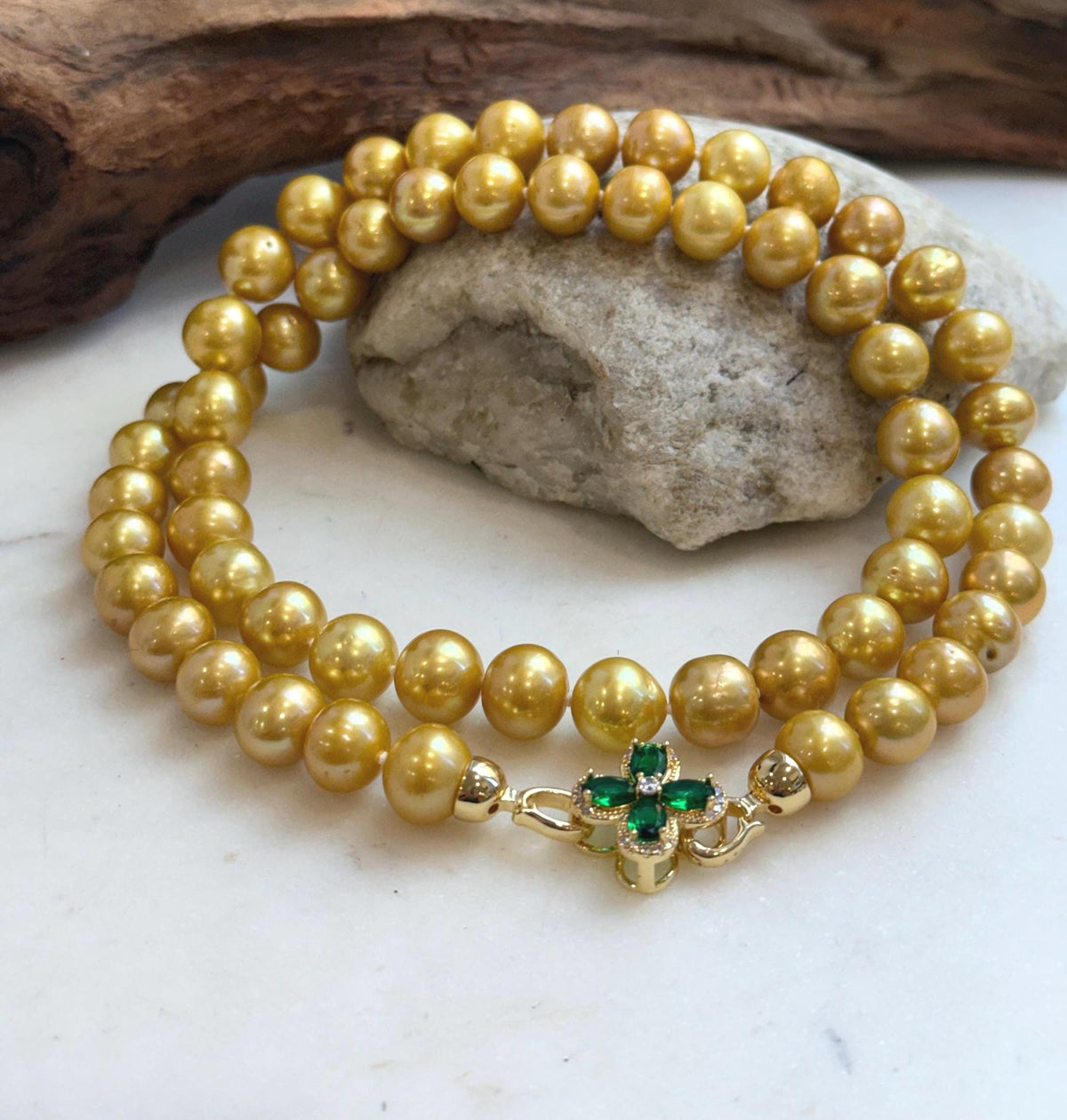 Golden pearl necklace featuring 58 genuine Edison pearls.