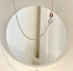 White and silver tones highlight the reflective surface of this South Sea pearl pendant.