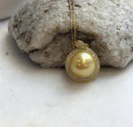 Lustrous South Sea saltwater pearl pendant in a warm golden shade