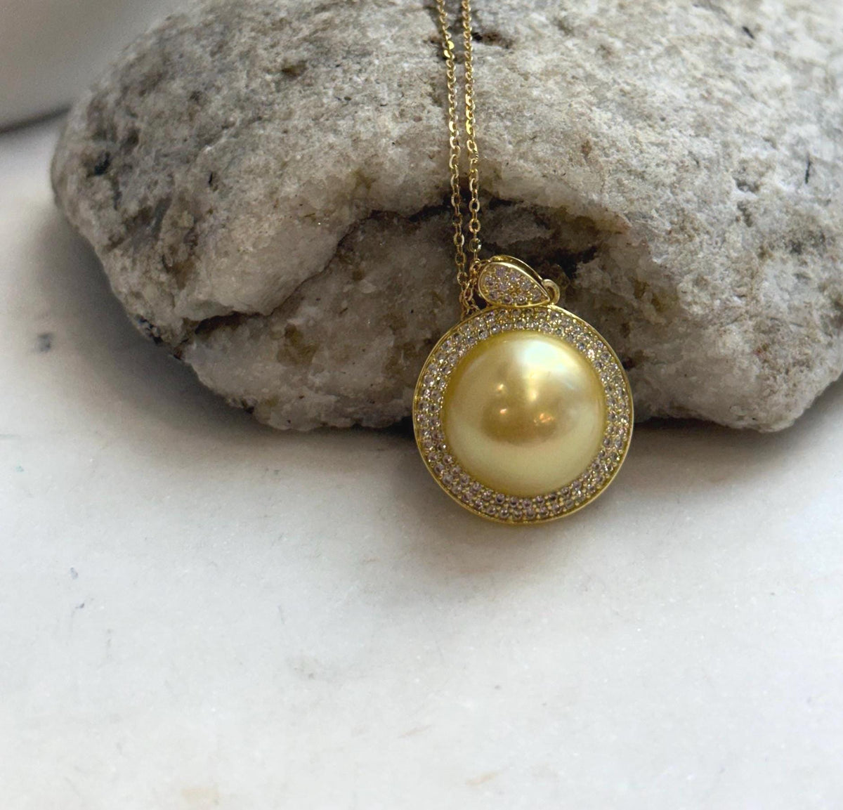 Lustrous South Sea saltwater pearl pendant in a warm golden shade