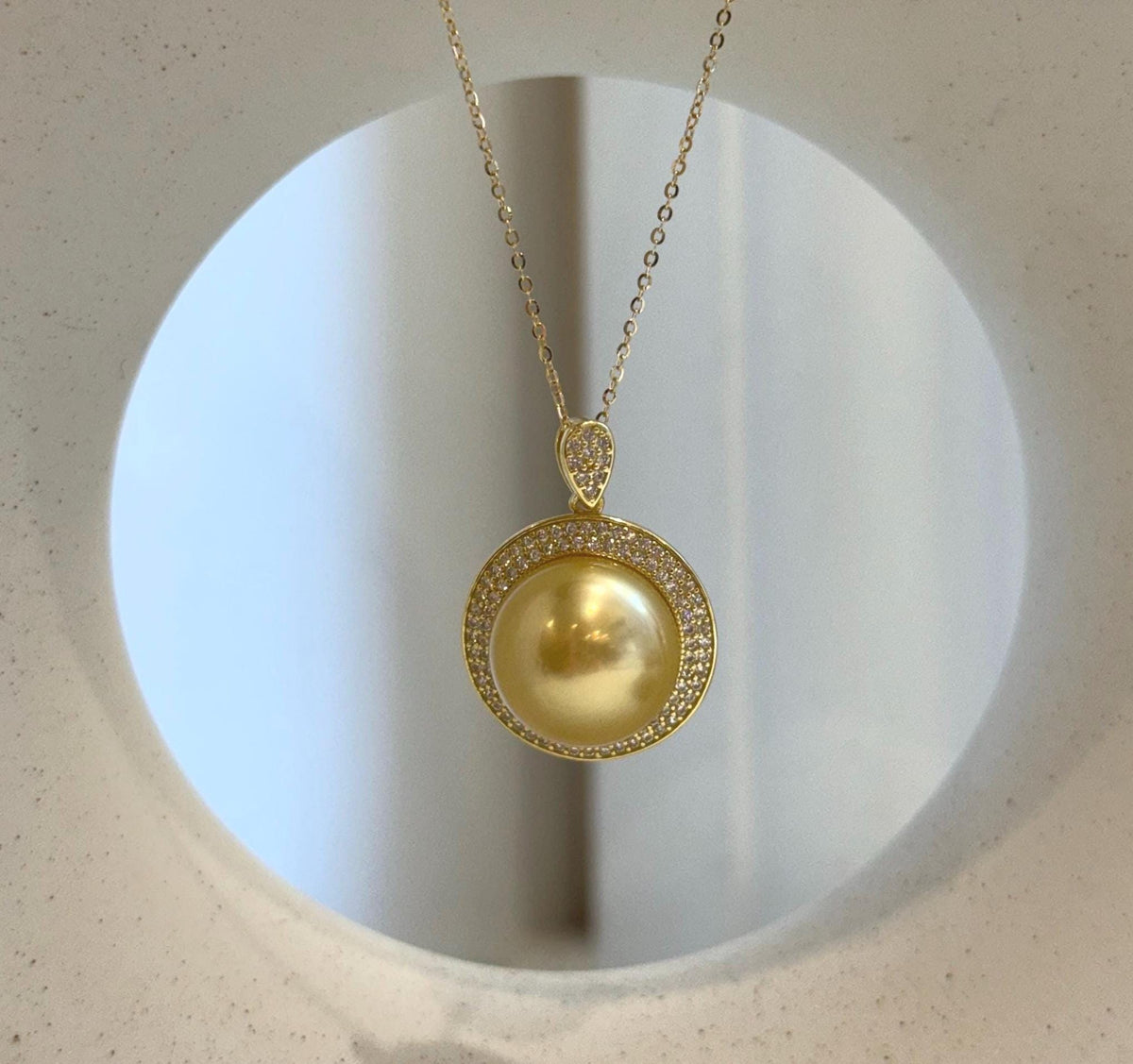 Golden South Sea pearl pendant necklace with sterling silver setting
