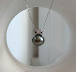 Peacock green Tahitian pearl owl pendant