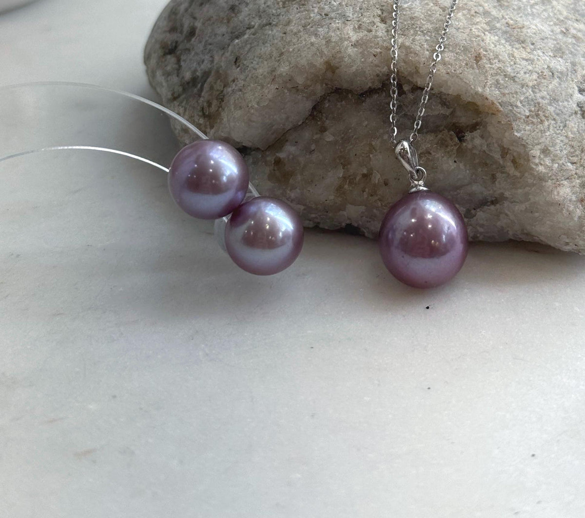Rose lavender pearl pendant on a delicate sterling silver chain.
