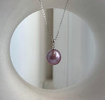 Matching Edison pearl stud earrings with glossy lavender tones.