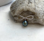 Silver bow necklace with a genuine Tahitian pearl and a fine oval-link chain.