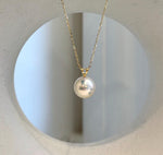 Ivory champagne Edison pearl pendant with mirror luster set in 18K solid gold