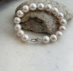 Lustrous white Edison pearls strung together in a classic bracelet.