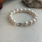 Edison freshwater pearl bracelet with bright reflective luster.