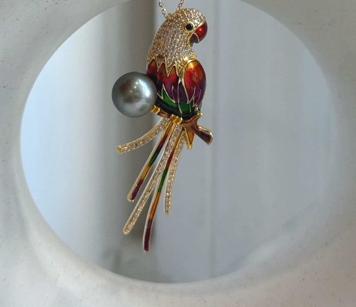 Tahitian pearl parrot jewelry designed to be worn as a brooch or pendant.