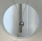 Peacock green Tahitian pearl pendant with crystal accents in S925 sterling silver.