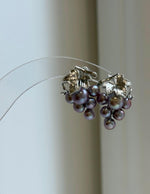 S925 silver earrings featuring genuine purple and green freshwater pearls.