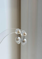 South Sea and freshwater pearl drop earrings with ivory white and silver tones.