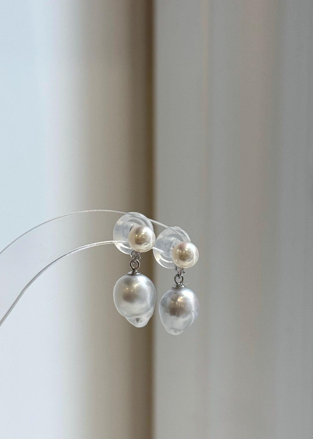 South Sea and freshwater pearl drop earrings with ivory white and silver tones.