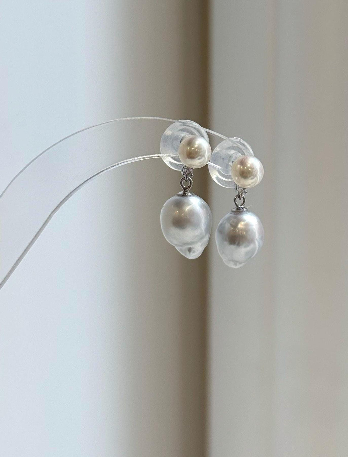 South Sea and freshwater pearls connected by small sterling silver rings.
